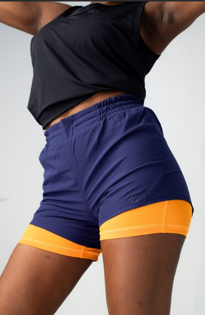 TCA WOMENS RUNING SPORT SHORTS WITH ZIP POCKETS IN NAVY