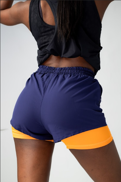 TCA WOMENS RUNING SPORT SHORTS WITH ZIP POCKETS IN NAVY